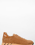 Tan sneaker on a white background