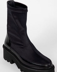Black boot on a white background