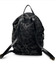 Black camouflage backpack on a white background