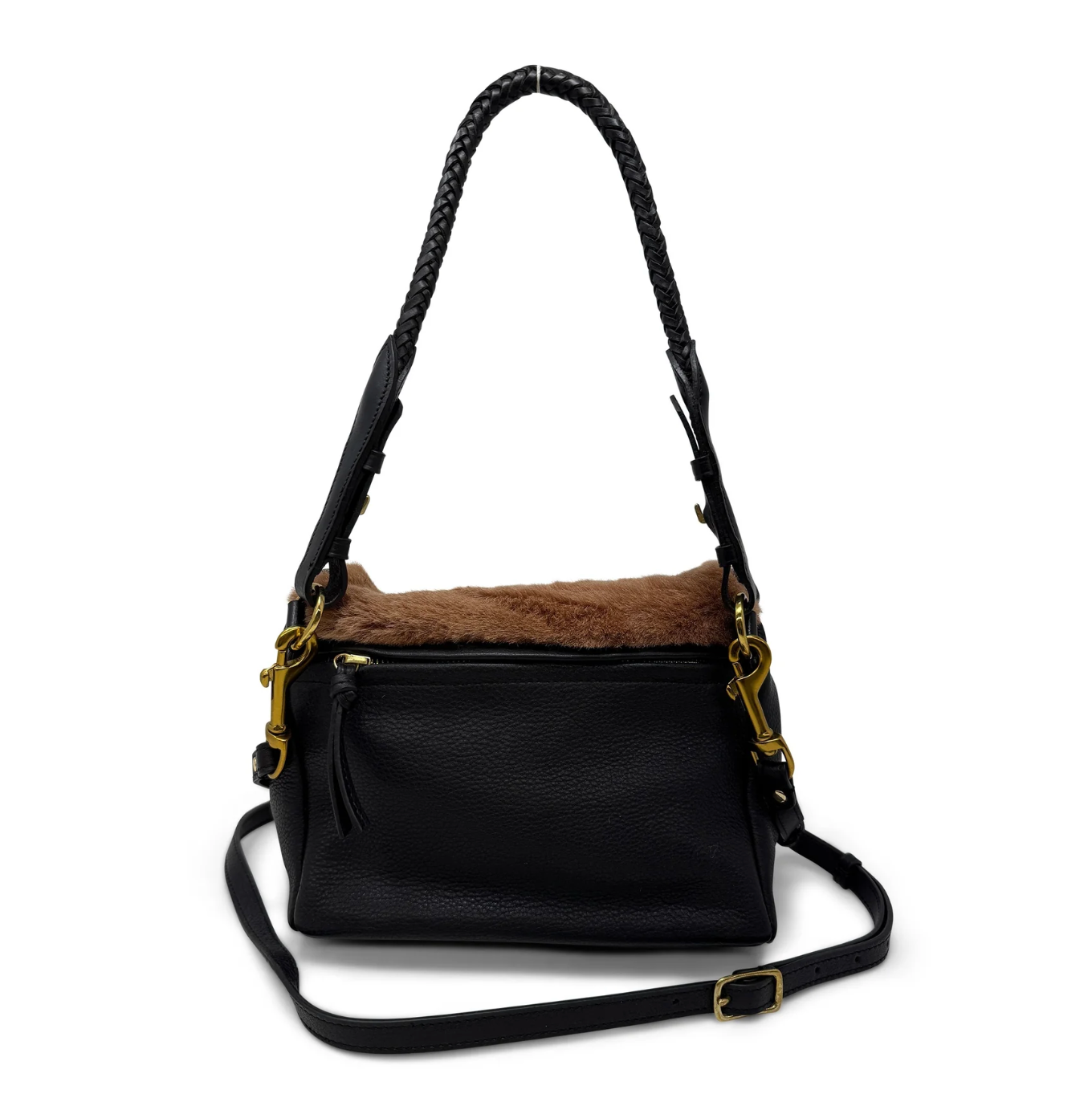 Black leather handbag with brown shearling interior on a white background