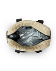 Voyager Travel Bag in Blonde Patent by Think Royln