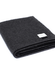 The Siempre Recycled Blanket in Speakeasy Charcol by Blacksaw