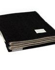 Icon Reversible Throw in Black by Blacksaw