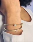 Yellow Gold Diamond Heart Bangle by Leela Grace