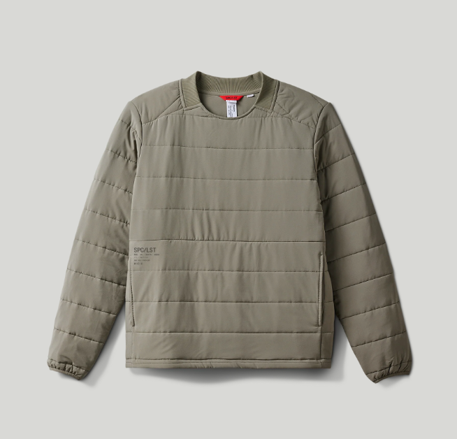 Green puffer jacket on a light gray background