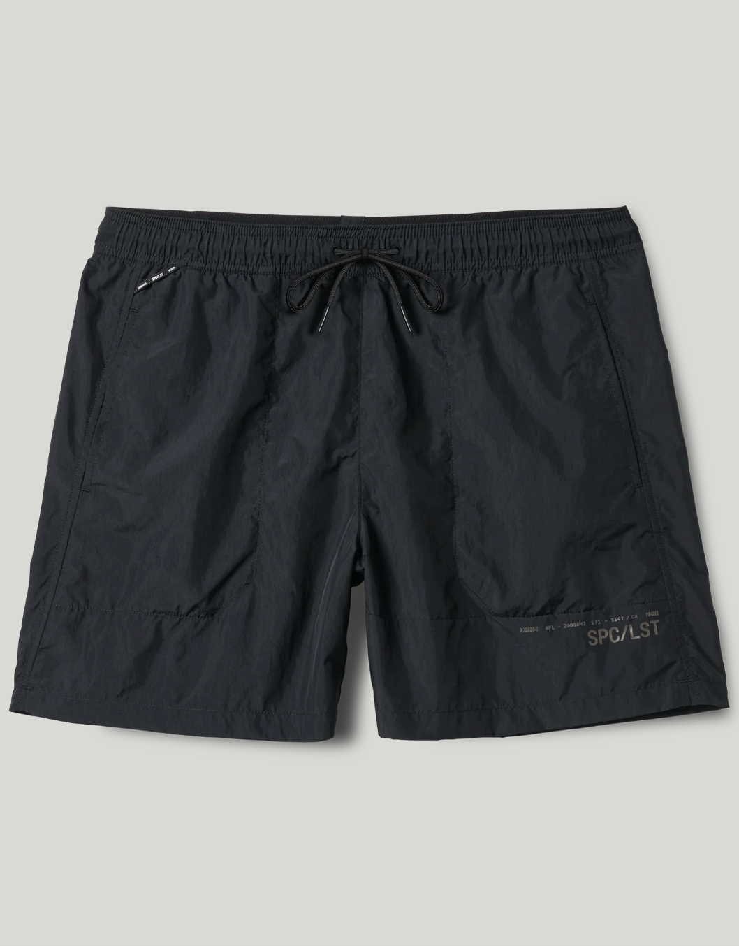 Black shorts with a brand logo on a light gray background