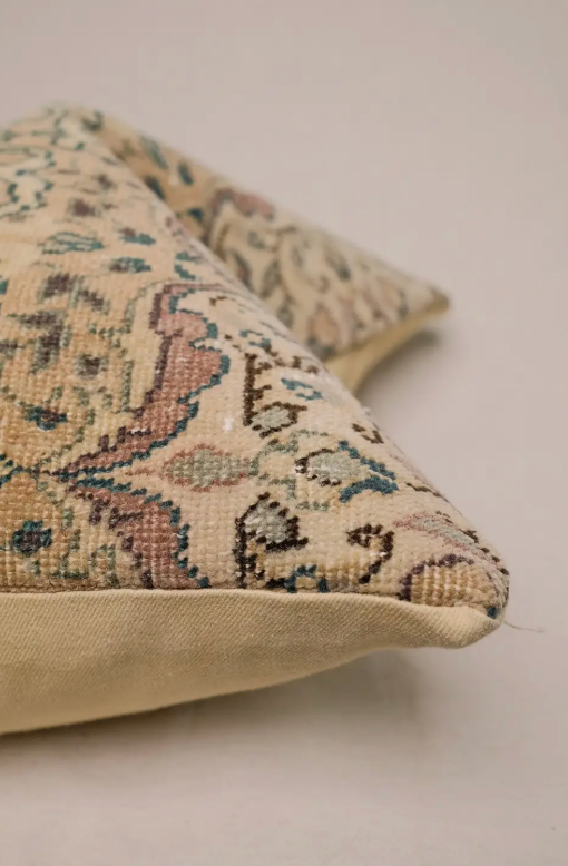 Patterned pillow on a plain background