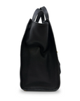 Black backpack on a white background