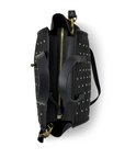 Black backpack with gold studs and zippers on a white background