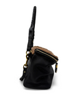 Black bag with a brown fur patch on a white background