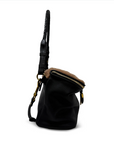 Black leather bag with brown top section on a white background