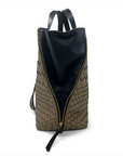 Backpack with geometric pattern and black interior on a white background