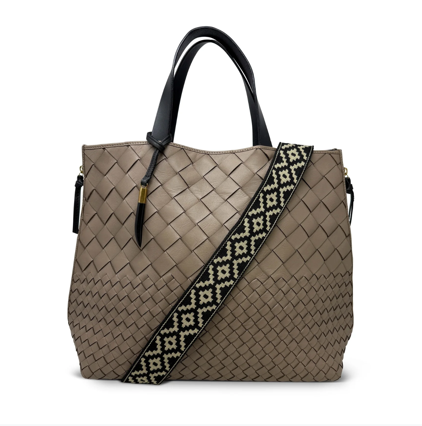 Beige woven handbag with a patterned strap on a white background