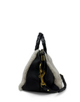 Black handbag with gold clasp on a white background