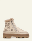 White ankle boot with decorative patterns and fur trim on a white background