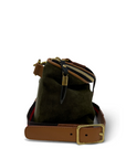 Brown leather bag with a gold buckle on a white background