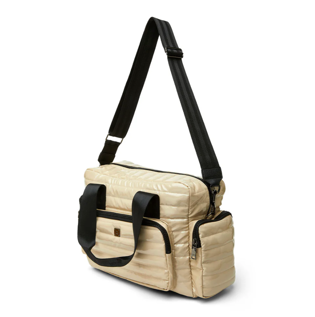 Voyager Travel Bag in Blonde Patent by Think Royln