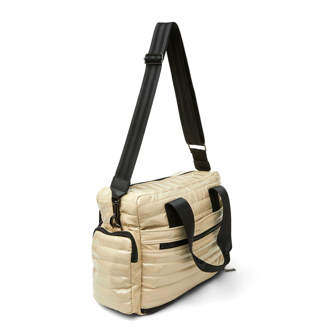 Voyager Travel Bag in Blonde Patent by Think Royln