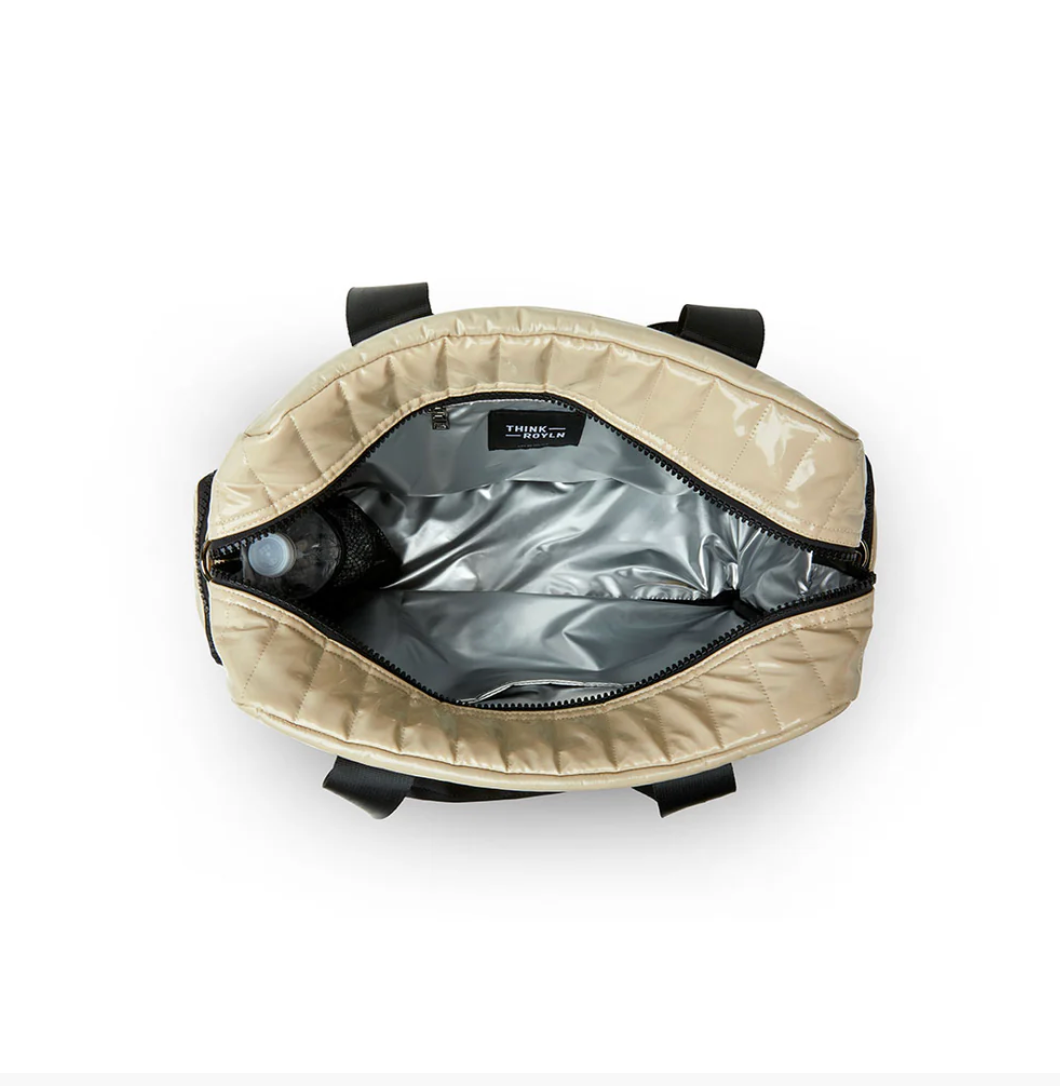 Voyager Travel Bag in Blonde Patent by Think Royln