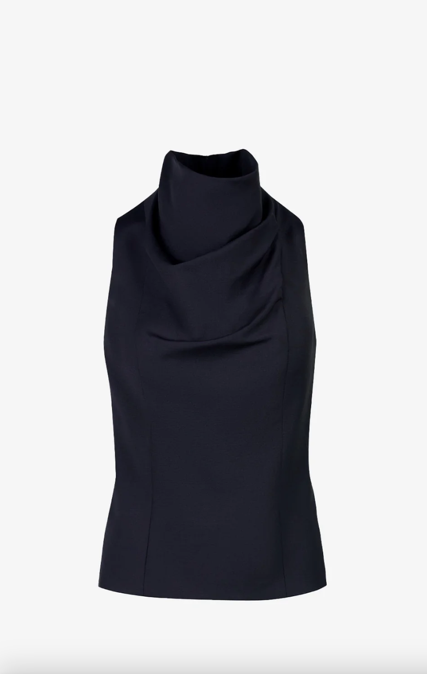 Black sleeveless top with a draped neckline on a white background